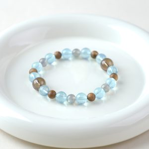 Moonlit Sea | Aquamarine & Agarwood Bracelet - Aquamarine, agarwood, grey moonstone, smoky quartz bracelet product photograph